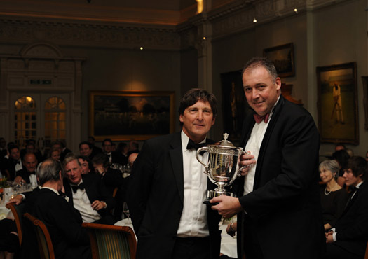 Middlesex’s Managing Director of Cricket, Angus Fraser, receives the Walter Lawrence Trophy, on behalf of Adam Gilchrist, from John Barclay