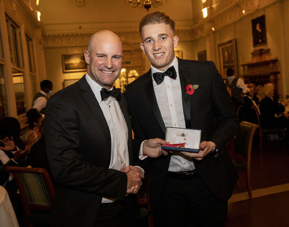 Jackpot: Walter Lawrence University Award winner, Jack Timby, receives a special medallion and a cheque for £500 from Andrew Strauss.