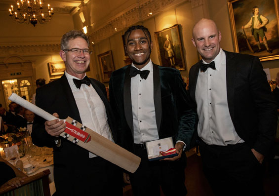 Young blade: Sheridon Gumbs, winner of the Walter Lawrence Schools Award, receives a special medallion and Gray-Nicolls bat, flanked by Richard Gray and Andrew Strauss.