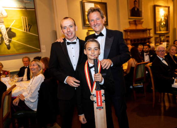 Big Brother Down Under: As Ronnie McKenna, winner of the Walter Lawrence Schools Award was playing cricket in Australia and unable to attend, his father, Anthony, and the youngest of three brothers, Charlie, were on hand to collect his spoils of a special medallion and Gray-Nicolls bat. Charlie on being asked who was the best batsman in the family claimed he was!